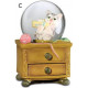 Boule de neige figurine Chat sur commode